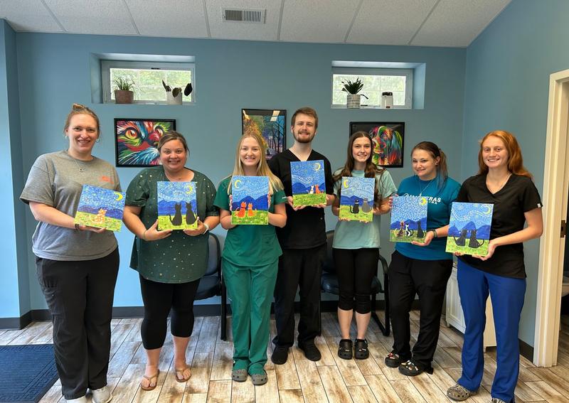 Carousel Slide 5: Celebrating our veterinary assistants with a paint party.